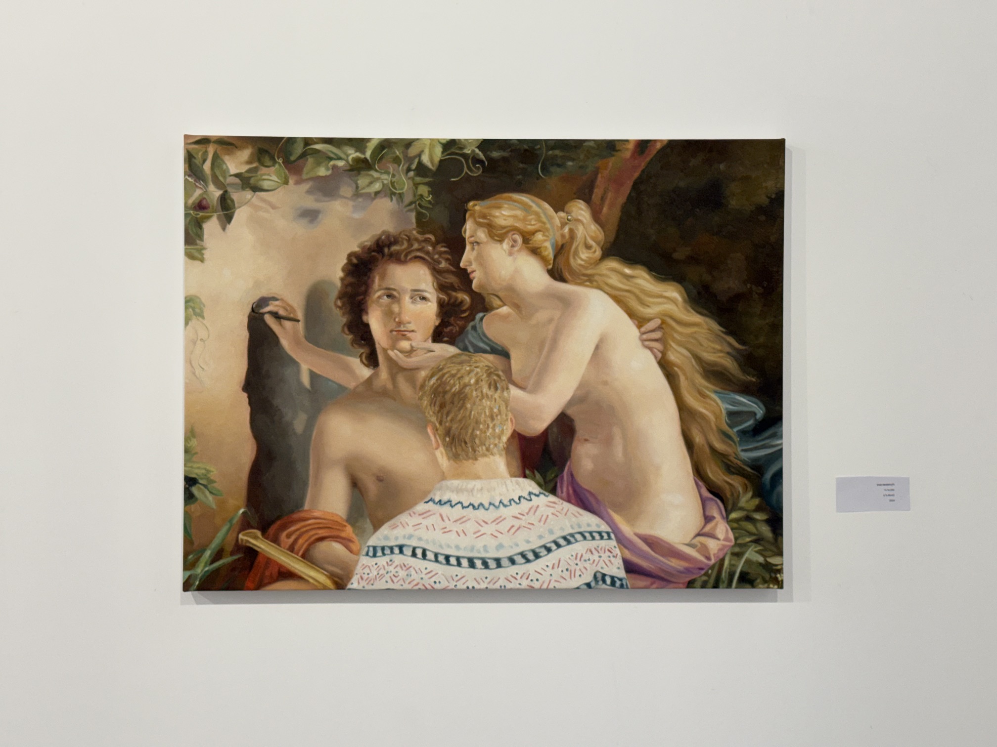 Installation view of a painting in dialogue with a classical artwork.