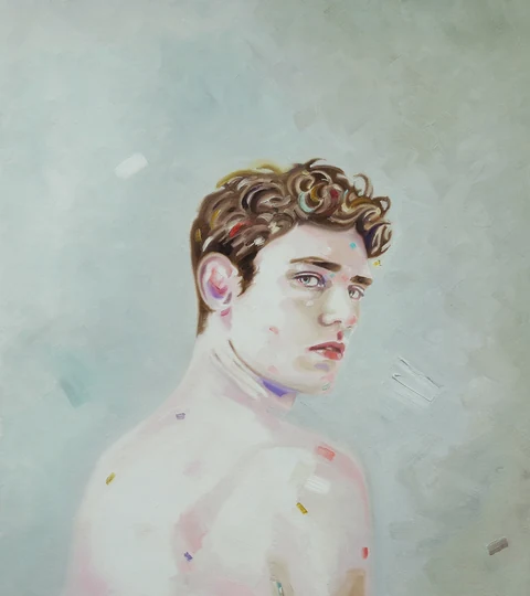 Bare-chested young man turned in profile against a pale blue background.