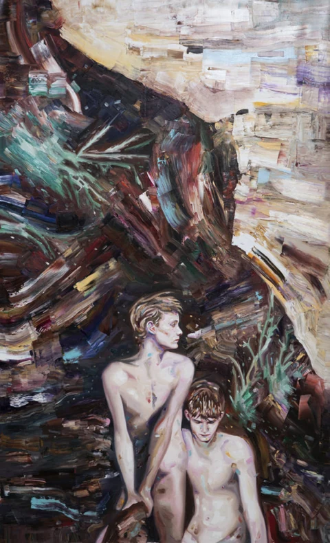 Two nude figures standing together in a dark, rocky wooded setting.