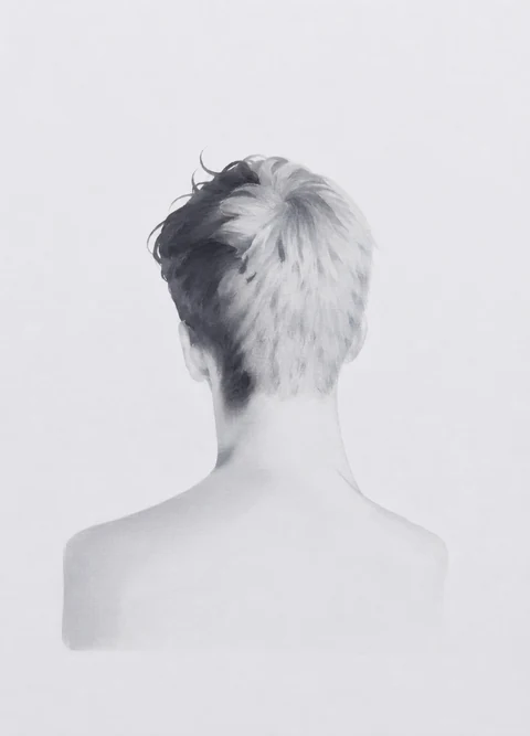 Rear view of a pale bare-shouldered figure with short light hair against a white background.