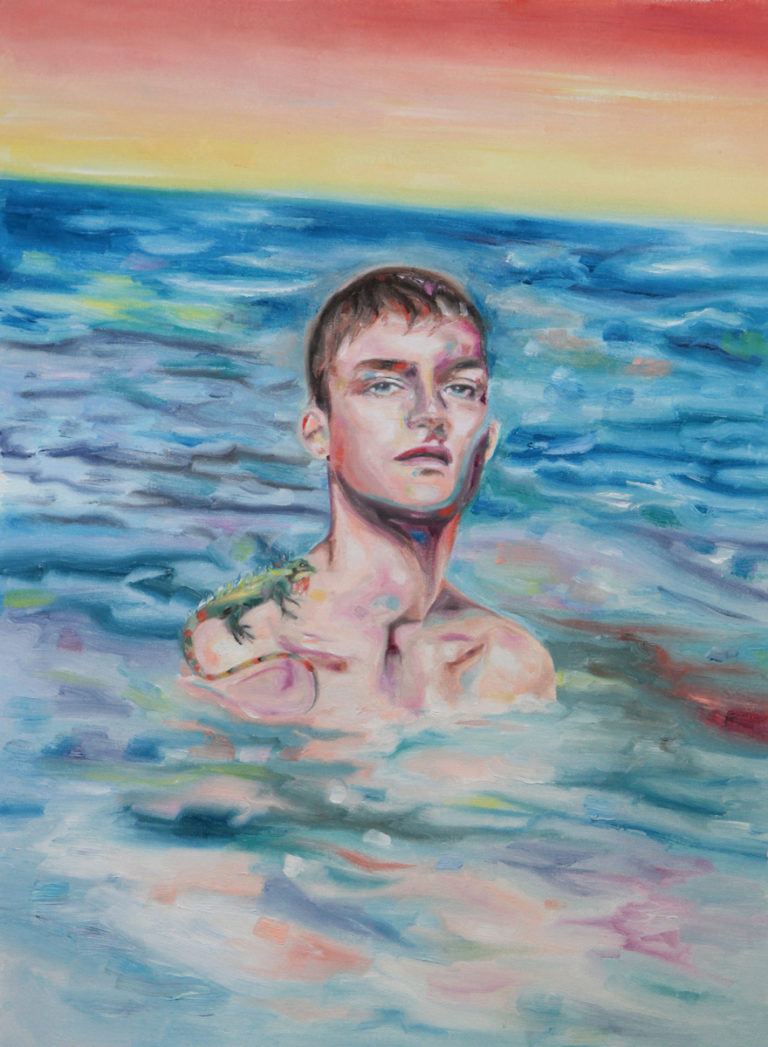 Bare-chested young man standing in blue water beneath a red-orange sky.