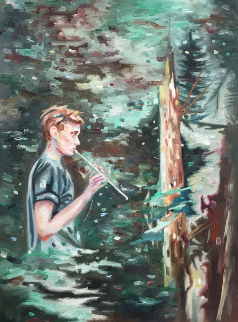 Young man standing in water beside a narrow tree trunk.