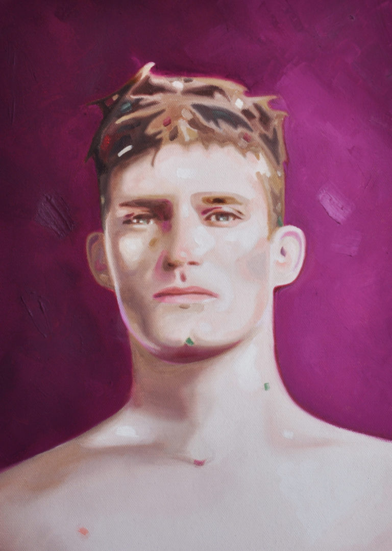 Bare-chested young man facing forward against a purple background.