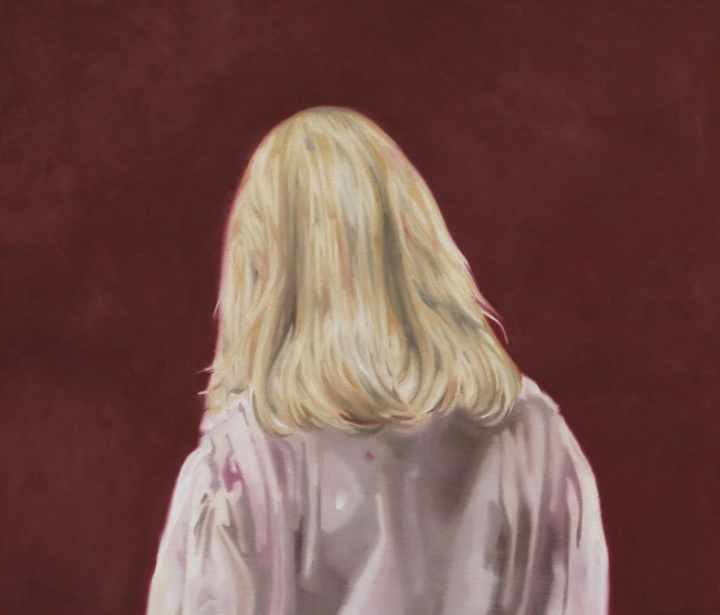 Blond figure seen from behind against a dark red background.